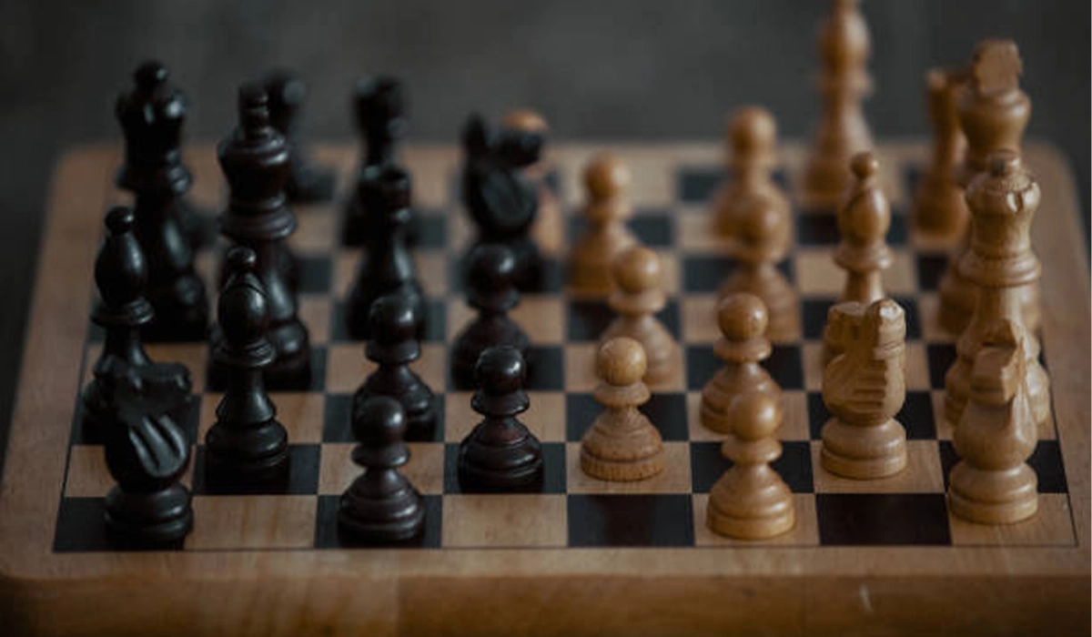 Black Stallion Pieces on Mahogany Chess Board in Ely